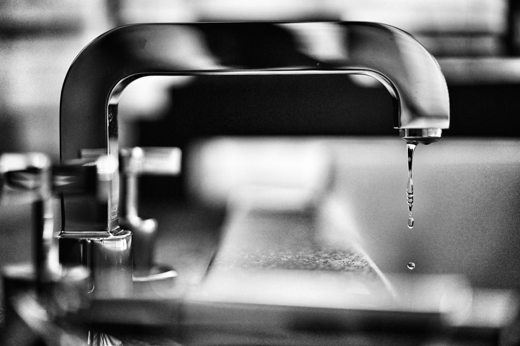 Leaking faucet plumber insurance