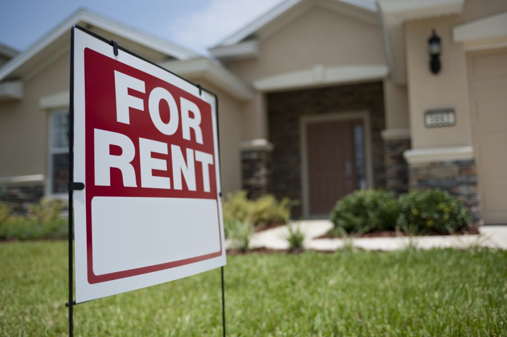 For rent sign in front of rental property