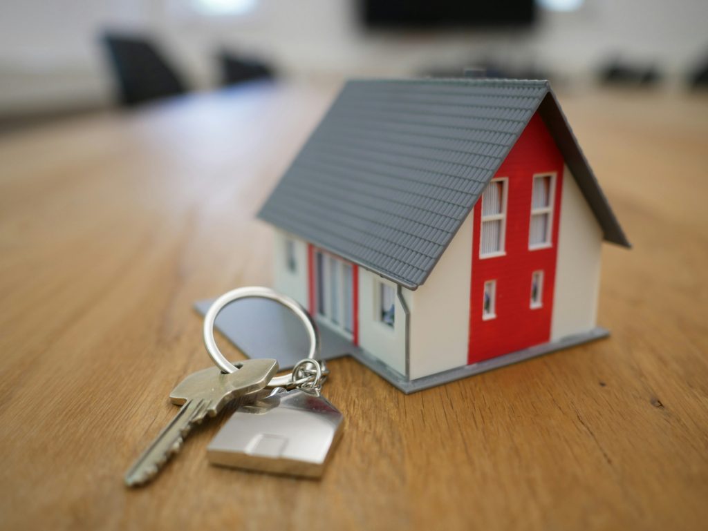 Toy house and real keys - rental property insurance