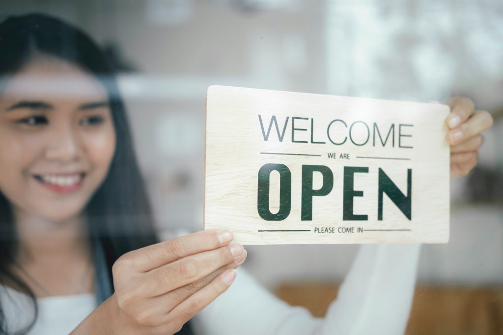 Welcome we are open sign - Business Insurance